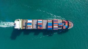 Top view of a cargo ship in the sea