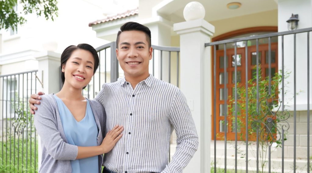 A young couple buying a foreclosed property